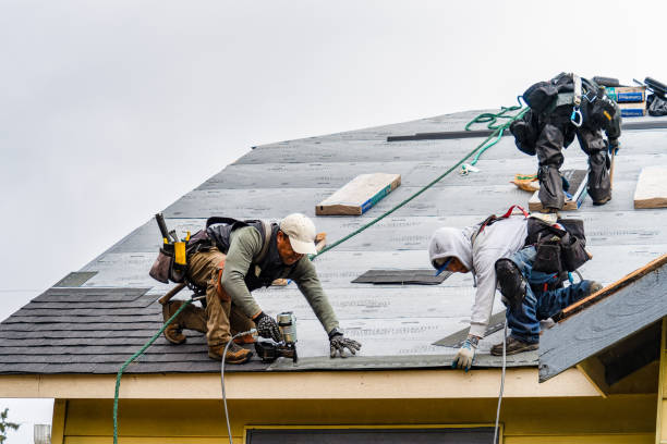Professional Roofing technician working in Russellville, OH